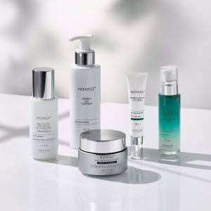 image of skincare products displayed on a white table