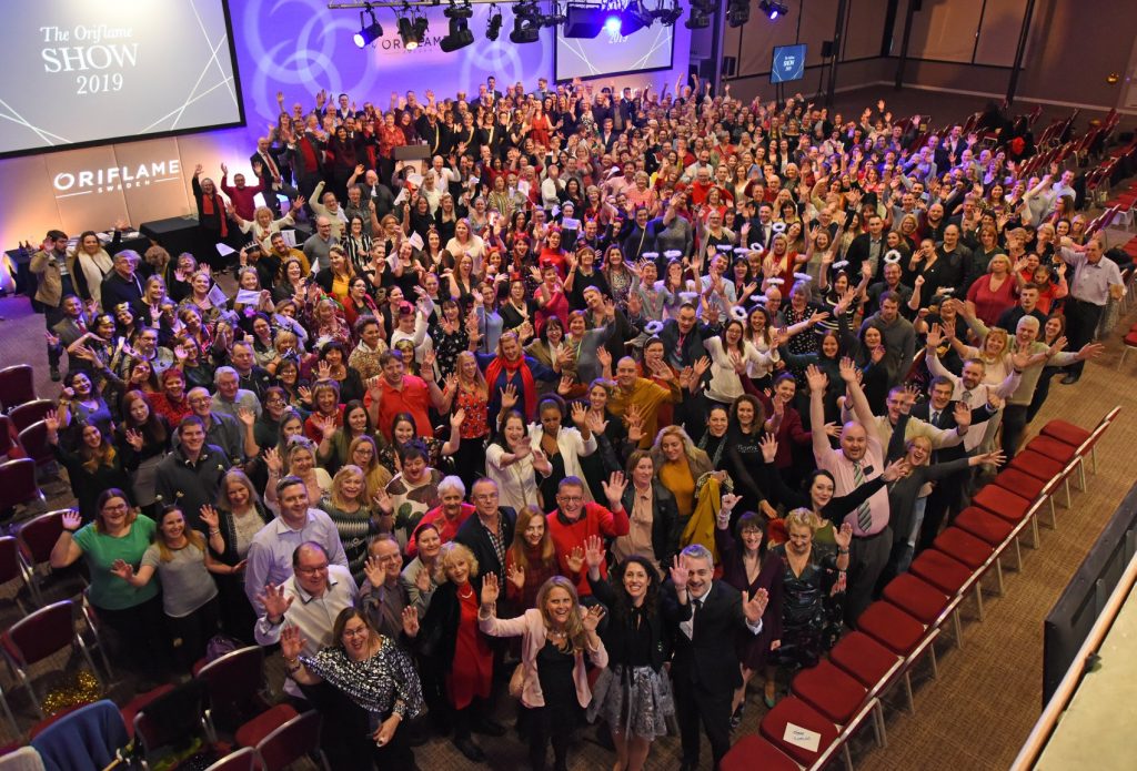 image shows an arial view of the attendees of the oriflame event